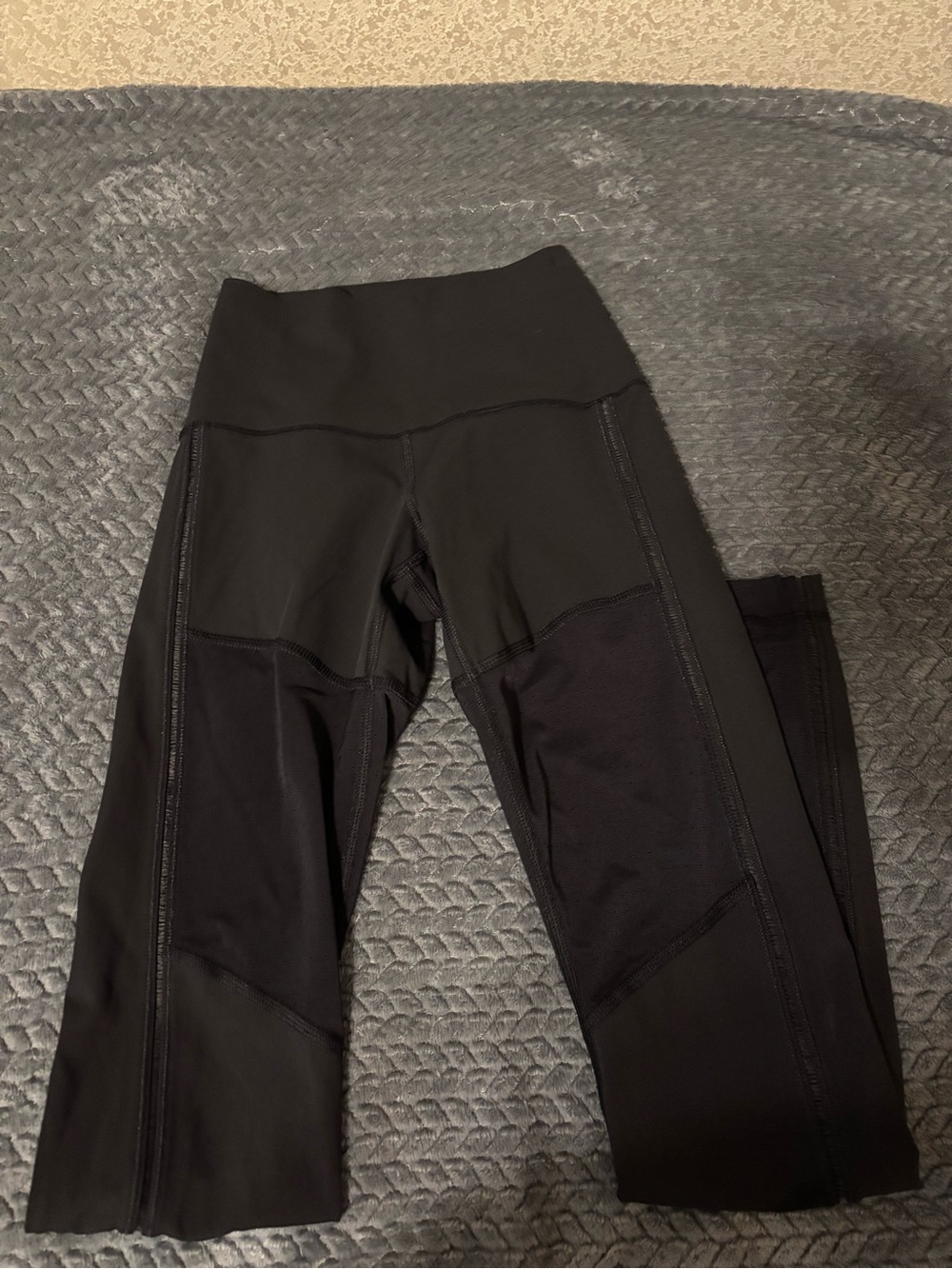 Black Lululemon leggings with mesh design (size 2)
